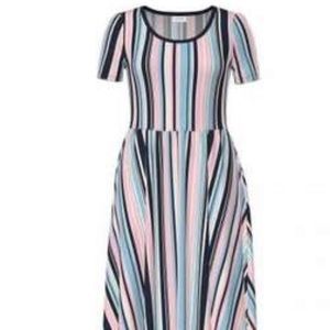 Lularoe Riley dress. New without tags size large but fits like an Xl or 1X